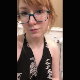 A cute redhead girl wearing glasses records herself from a between the legs perspective as she takes a shit and piss into a toilet. Vertical HD format video. About 1.5 minutes.